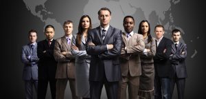 Businessmen standing in front of an earth map